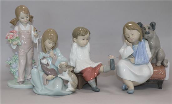 Four Lladro figures, boxed, tallest 18cm